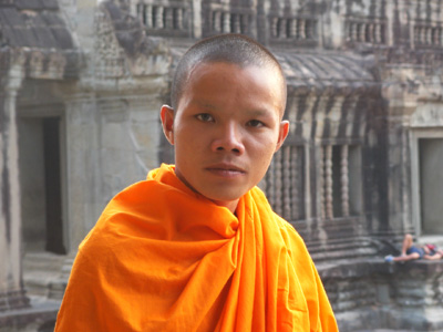 Enterprising Buddhist monk at Angkor Wat ©UrbisMedia