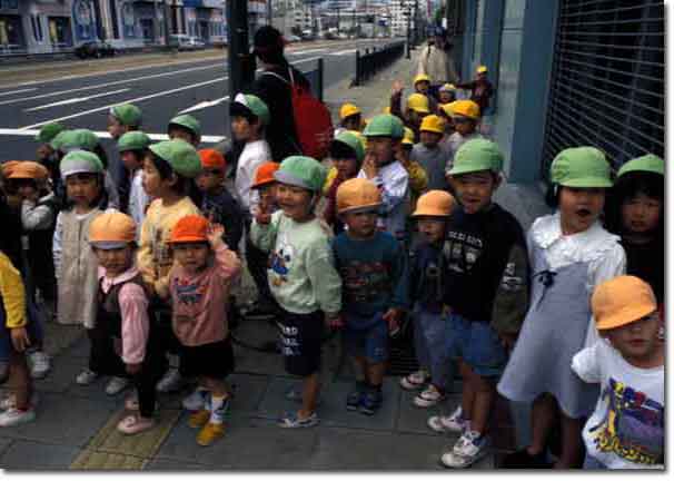 Nagasaki kids. When will the truth detonate over them? ©1997 James A. Clapp