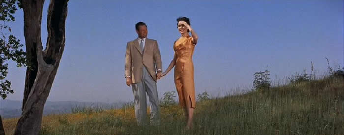 William Holden and Jennifer Jones on a “high and windy hill” in Hong Kong © 1955, 20th Century Fox